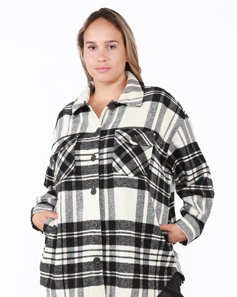 Front of a model wearing a size 0X Ainhoa Plaid Snap Front Shacket in Black / White by DEX PLUS. | dia_product_style_image_id:235522